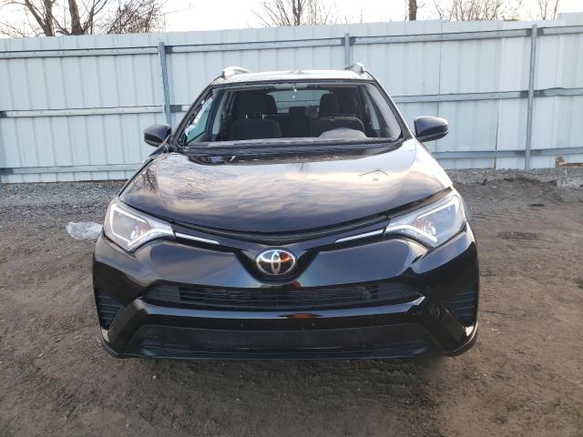 Photo 5 from auction – 2018 TOYOTA RAV4 LE with VIN 2T3ZFREV4JW513795
