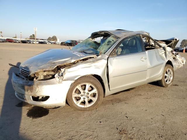 TOYOTA CAMRY LE 2005 with VIN JTDBF32KX50165276 - Photo from auction