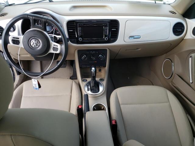 Photo 8 from auction – 2014 VOLKSWAGEN BEETLE with VIN 3VWJP7ATXEM620051