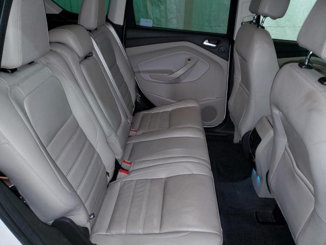 Photo 11 from auction – 2017 FORD ESCAPE TIT with VIN 1FMCU9J96HUE21563