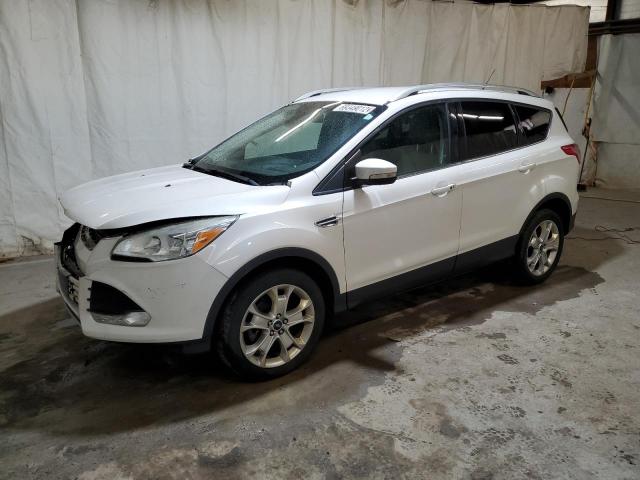 FORD ESCAPE TIT 2014 with VIN 1FMCU9J98EUE57704 - Photo from auction