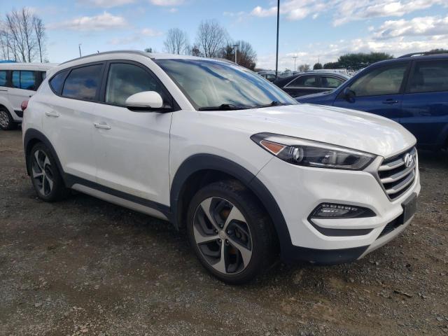 Photo 4 from auction – 2017 HYUNDAI TUCSON LIM with VIN KM8J3CA25HU391630
