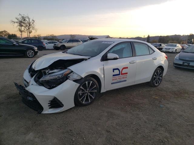 TOYOTA COROLLA L 2017 with VIN 5YFBURHE0HP700605 - Photo from auction