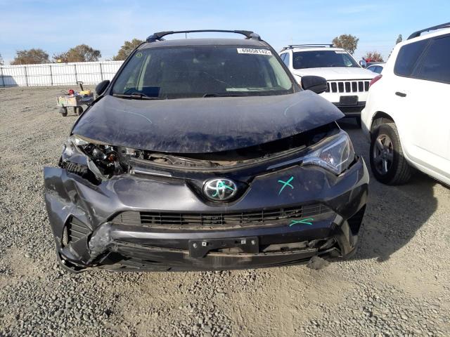 Photo 5 from auction – 2018 TOYOTA RAV4 LE with VIN JTMZFREV8JJ752507