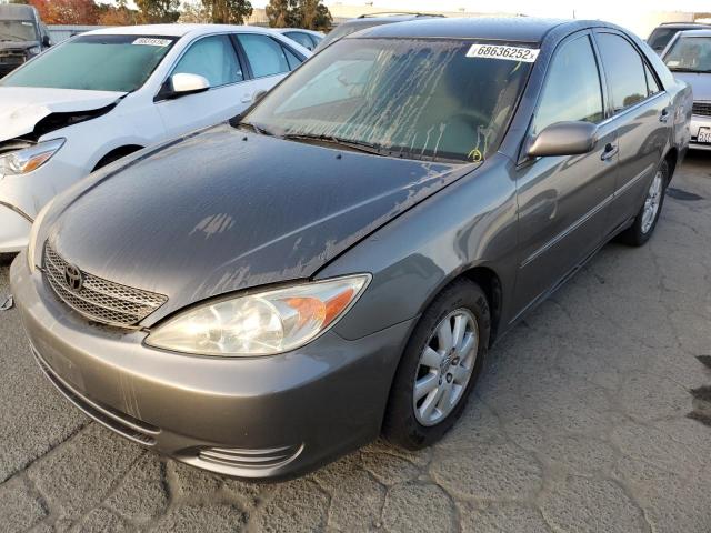 TOYOTA CAMRY LE 2002 with VIN 4T1BE30K12U578628 - Photo from auction