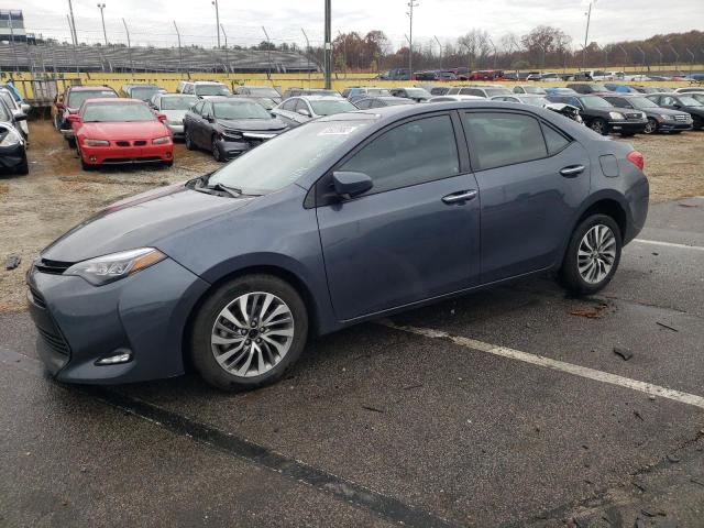 TOYOTA COROLLA L 2018 with VIN 5YFBURHE7JP750732 - Photo from auction