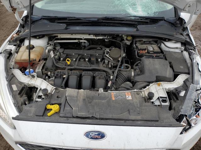 Photo 11 from auction – 2015 FORD FOCUS SE with VIN 1FADP3K29FL283475