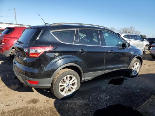 Photo 3 from auction – 2017 FORD ESCAPE SE with VIN 1FMCU9G92HUB75618