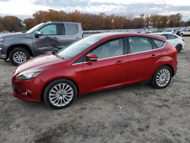 FORD FOCUS TITA 2012 with VIN 1FAHP3N22CL402380 - Photo from auction