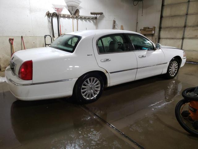 Photo 3 from auction – 2003 LINCOLN TOWN CAR E with VIN 1LNHM81W93Y624728