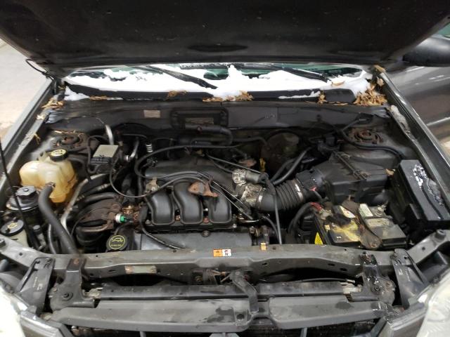 Photo 12 from auction – 2003 MAZDA TRIBUTE LX with VIN 4F2YZ94133KM40206