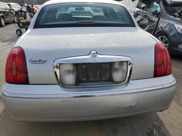 Photo 6 from auction – 1999 LINCOLN TOWN CAR E with VIN 1LNHM81W2XY632918