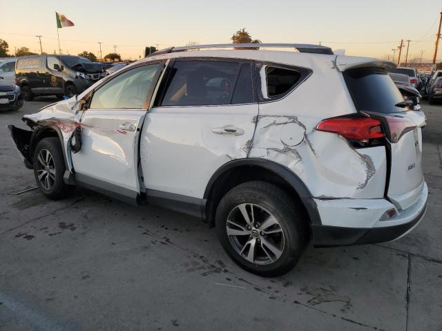 Photo 2 from auction – 2016 TOYOTA RAV4 XLE with VIN JTMWFREV8GD087201