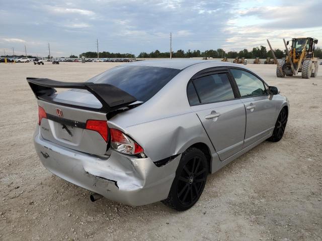 Photo 3 from auction – 2011 HONDA CIVIC LX with VIN 19XFA1F54BE030211