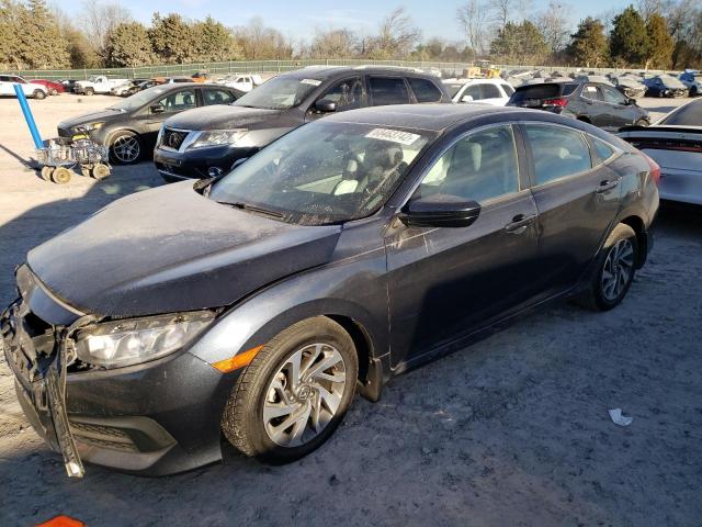 HONDA CIVIC EX 2017 with VIN 19XFC2F75HE066693 - Photo from auction