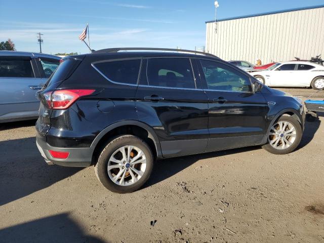 Photo 3 from auction – 2018 FORD ESCAPE SE with VIN 1FMCU0GD0JUA78651