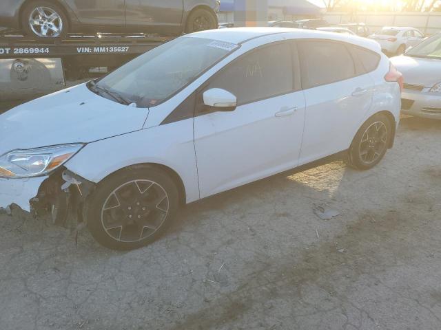 FORD FOCUS SE 2014 with VIN 1FADP3K25EL218802 - Photo from auction