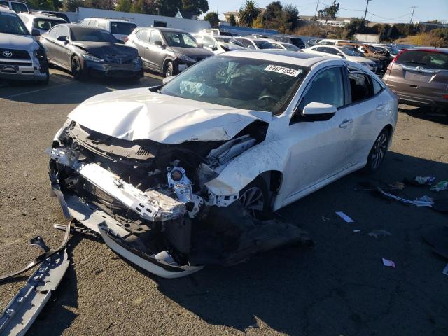 HONDA CIVIC EX 2018 with VIN 19XFC2F78JE209545 - Photo from auction