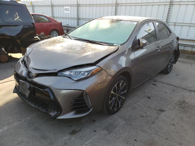 TOYOTA COROLLA L 2017 with VIN 5YFBURHEXHP638727 - Photo from auction