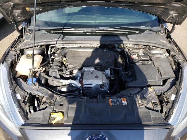 Photo 11 from auction – 2015 FORD FOCUS SE with VIN 1FADP3KE8FL267102