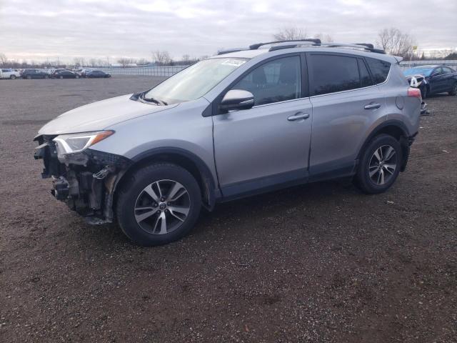 TOYOTA RAV4 LE 2018 with VIN 2T3BFREV1JW772634 - Photo from auction
