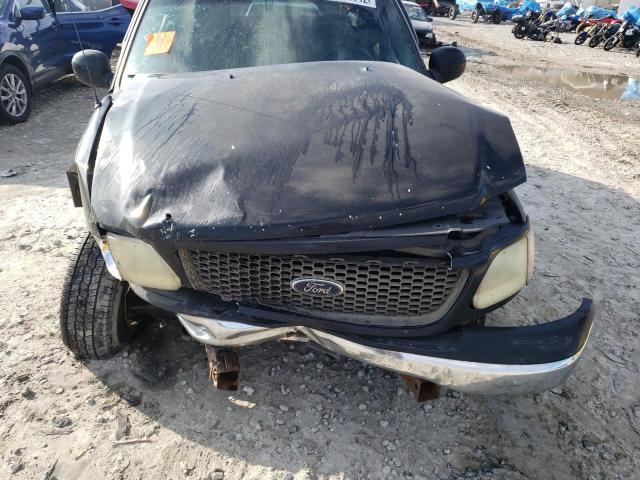 Photo 11 from auction – 2002 FORD F-150 LARI with VIN 1FTRX17WX2NB48715