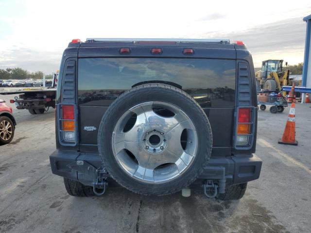 Photo 6 from auction – 2003 HUMMER H2 with VIN 5GRGN23U73H135944