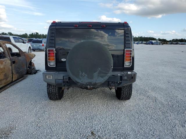 Photo 6 from auction – 2003 HUMMER H2 with VIN 5GRGN23U23H138704