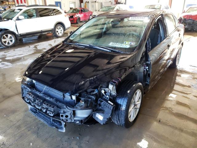 FORD FOCUS SE 2016 with VIN 1FADP3F27GL220256 - Photo from auction