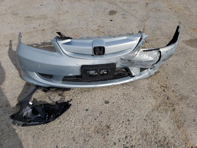 Photo 12 from auction – 2004 HONDA CIVIC HYBR with VIN JHMES96674S003907
