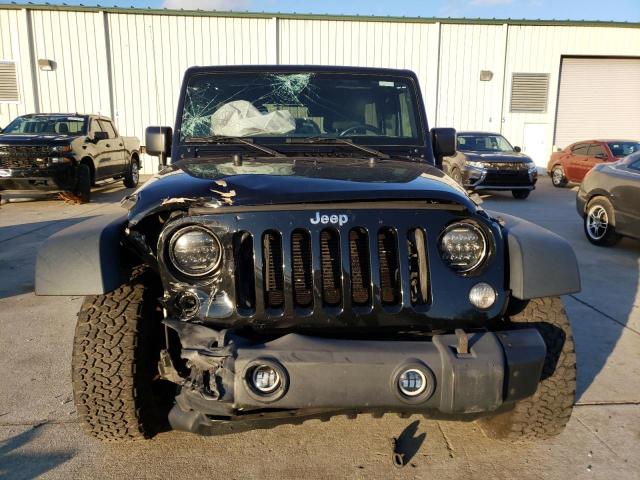 Photo 5 from auction – 2015 JEEP WRANGLER U with VIN 1C4BJWDG3FL732047