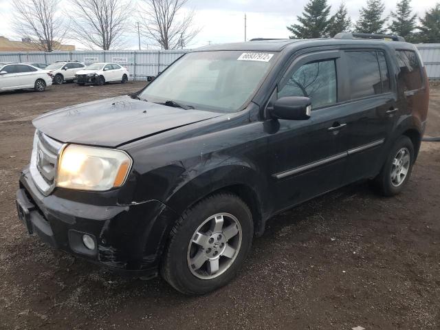 HONDA PILOT TOUR 2010 with VIN 5FNYF4H94AB504940 - Photo from auction