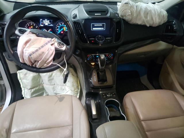 Photo 8 from auction – 2015 FORD ESCAPE TIT with VIN 1FMCU9J98FUC04481