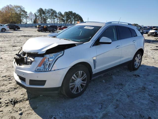 CADILLAC SRX 2011 with VIN 3GYFNAEYXBS614236 - Photo from auction