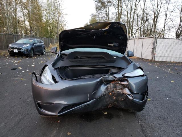Photo 5 from auction – 2022 TESLA MODEL Y with VIN 7SAYGAEE7NF429351