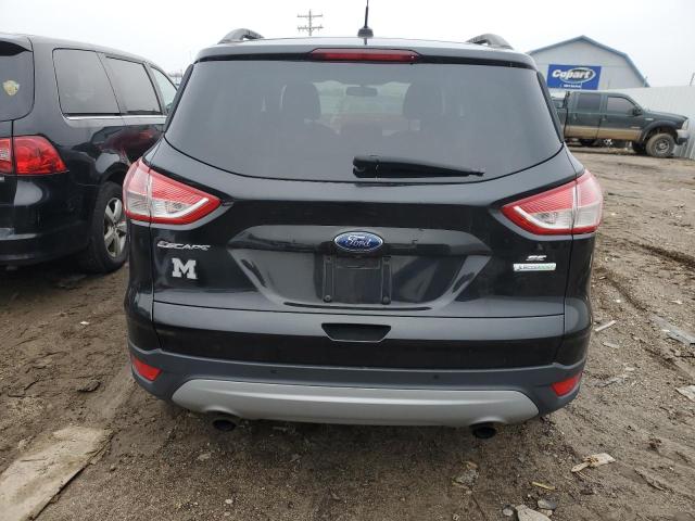 Photo 6 from auction – 2015 FORD ESCAPE SE with VIN 1FMCU0GX0FUA30942