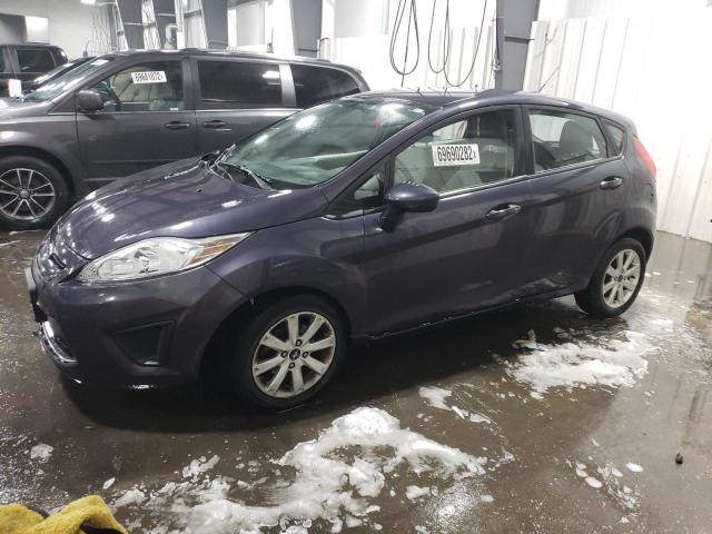 FORD FIESTA SE 2012 with VIN 3FADP4EJ4CM111924 - Photo from auction