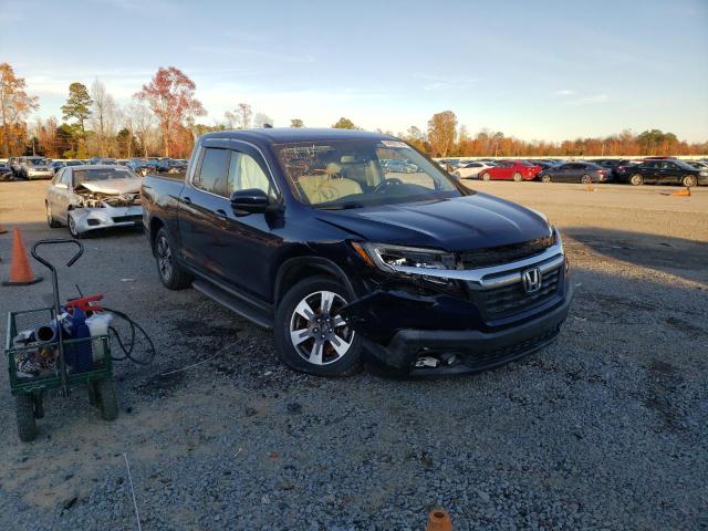 Photo 4 from auction – 2017 HONDA RIDGELINE with VIN 5FPYK2F63HB007095