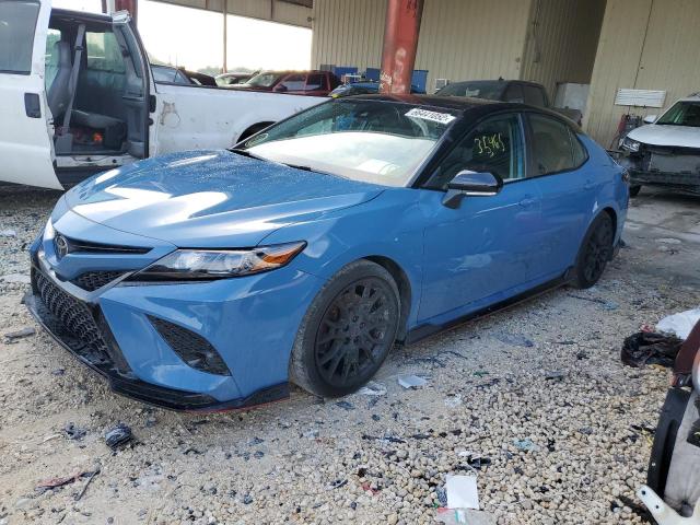 TOYOTA CAMRY TRD 2022 with VIN 4T1KZ1AK2NU064668 - Photo from auction