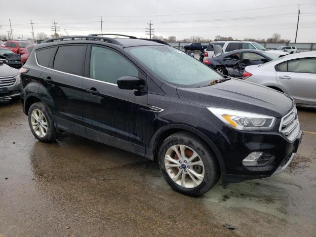 Photo 4 from auction – 2017 FORD ESCAPE SE with VIN 1FMCU9GD8HUC27693