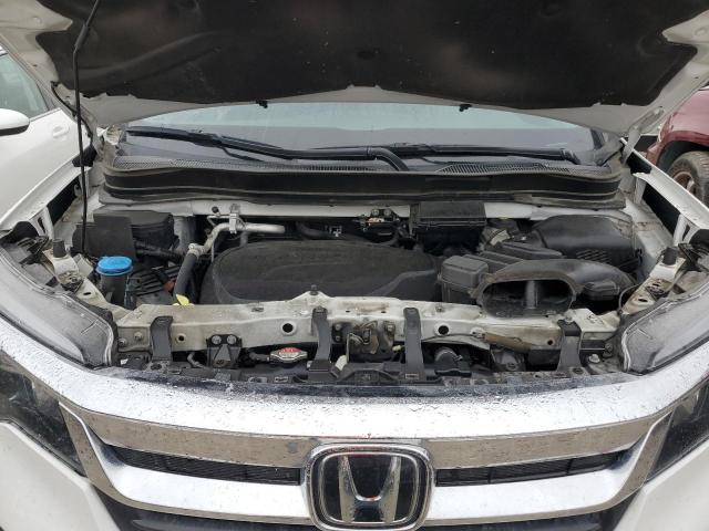 Photo 12 from auction – 2021 HONDA PILOT EX with VIN 5FNYF5H32MB010694