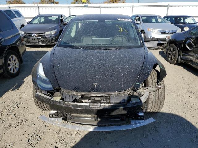 Photo 5 from auction – 2022 TESLA MODEL 3 with VIN 5YJ3E1EA6NF303816