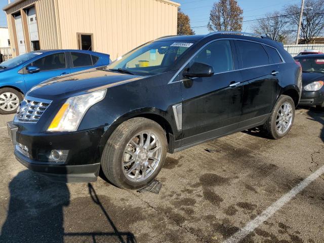 CADILLAC SRX PERFOR 2013 with VIN 3GYFNDE34DS653249 - Photo from auction