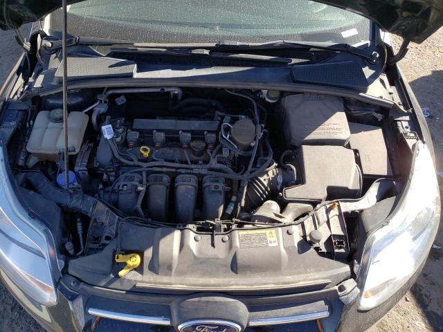 Photo 11 from auction – 2014 FORD FOCUS SE with VIN 1FADP3K29EL184962