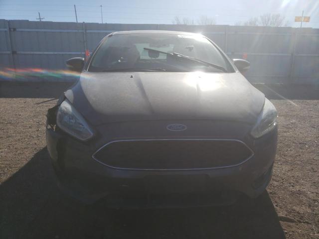 Photo 5 from auction – 2015 FORD FOCUS SE with VIN 1FADP3F24FL340952