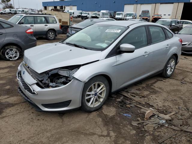 FORD FOCUS SE 2018 with VIN 1FADP3F21JL239859 - Photo from auction