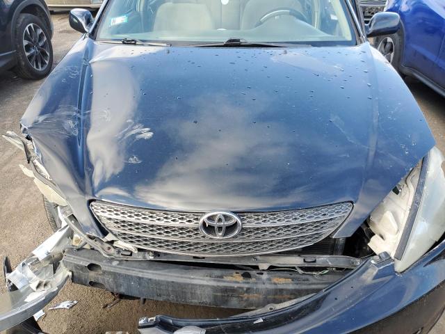 Photo 11 from auction – 2003 TOYOTA CAMRY LE with VIN 4T1BE32K03U250003