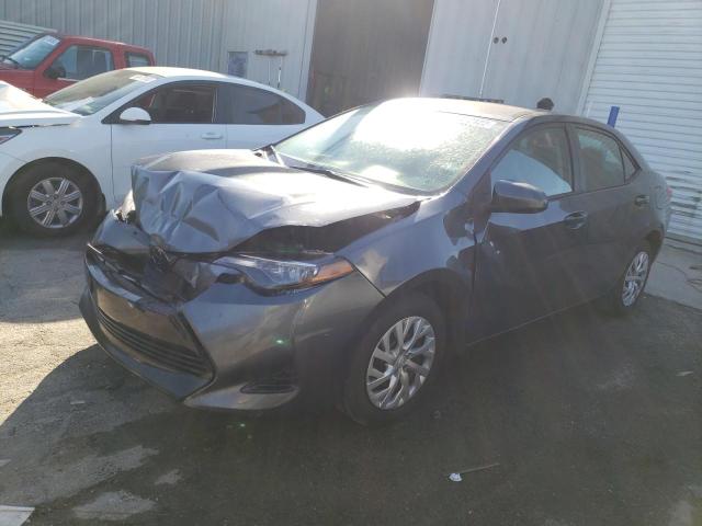 TOYOTA COROLLA 2018 with VIN 5YFBURHE6JP842334 - Photo from auction