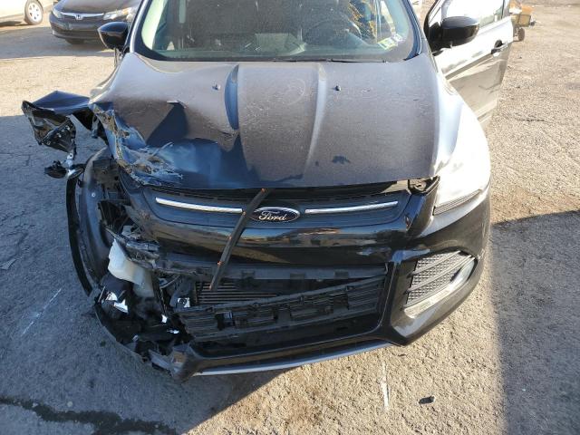 Photo 11 from auction – 2015 FORD ESCAPE SE with VIN 1FMCU9G99FUB44640