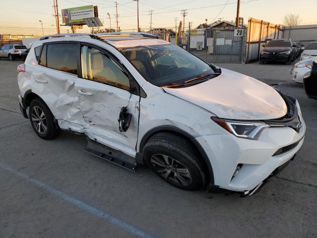 Photo 4 from auction – 2016 TOYOTA RAV4 XLE with VIN JTMWFREV8GD087201